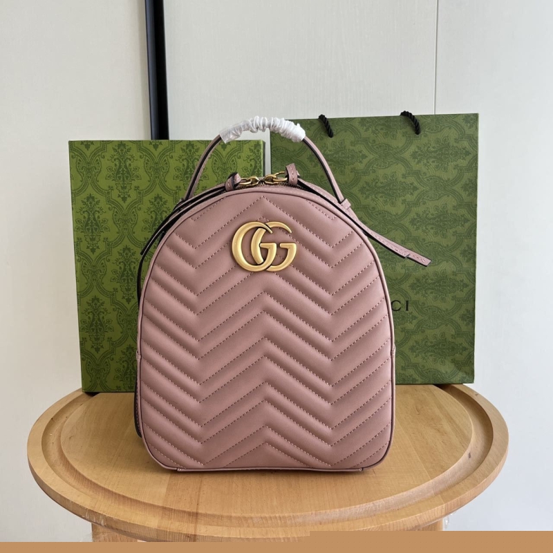 G*u*i backpacks